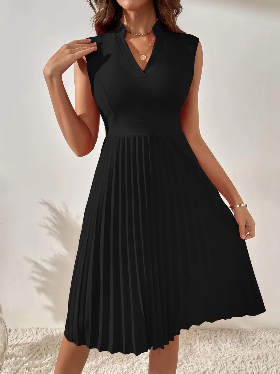 WhatsApp Image 2024-12-14 at 7.05.35 AM (4) Vestido línea A plisado negro - Imagen 1