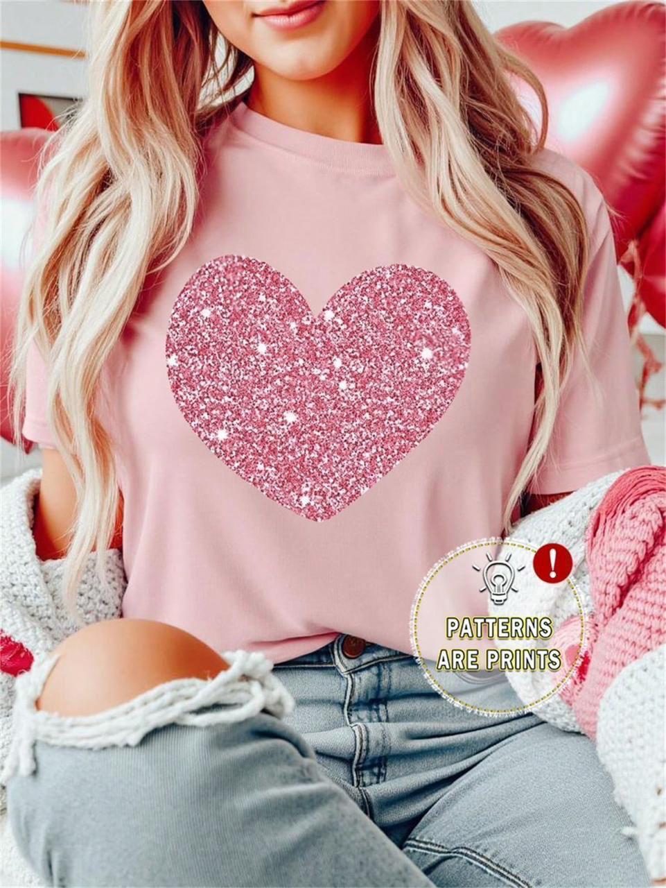 WhatsApp Image 2025-06-24 at 7.49.52 AM (1) Blusa Rosada con Estampado de Corazón - Imagen 1